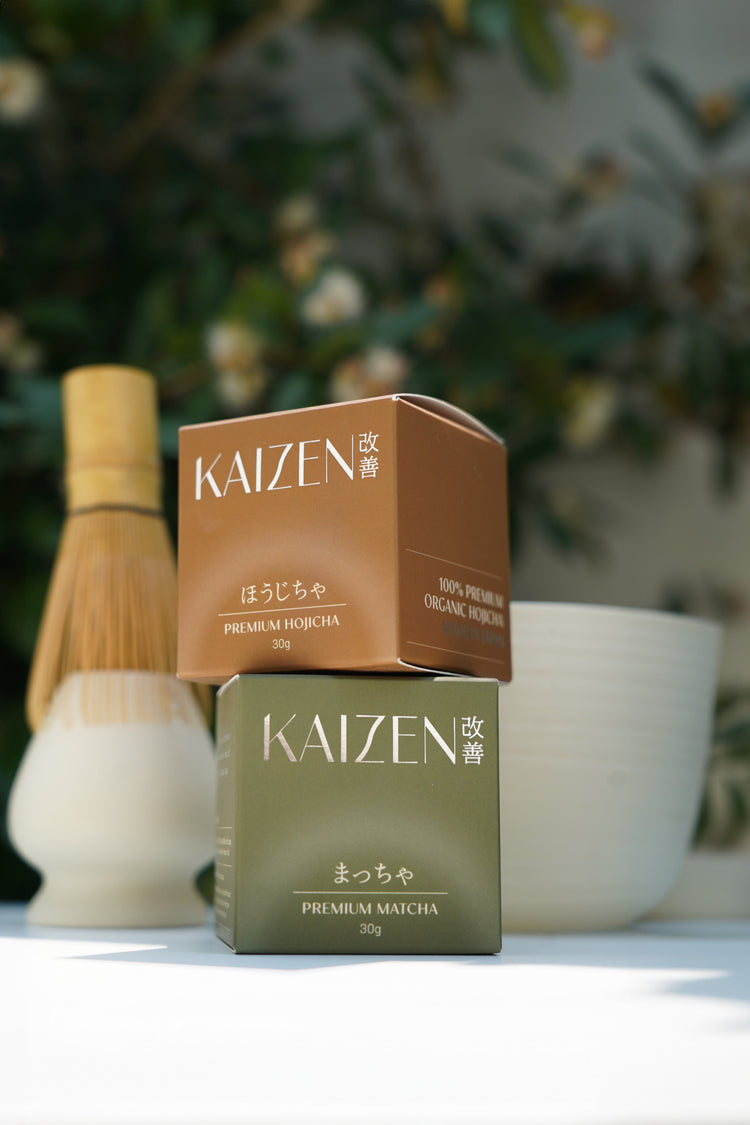 kaizen matcha box and kaizen hojicha box stacked 